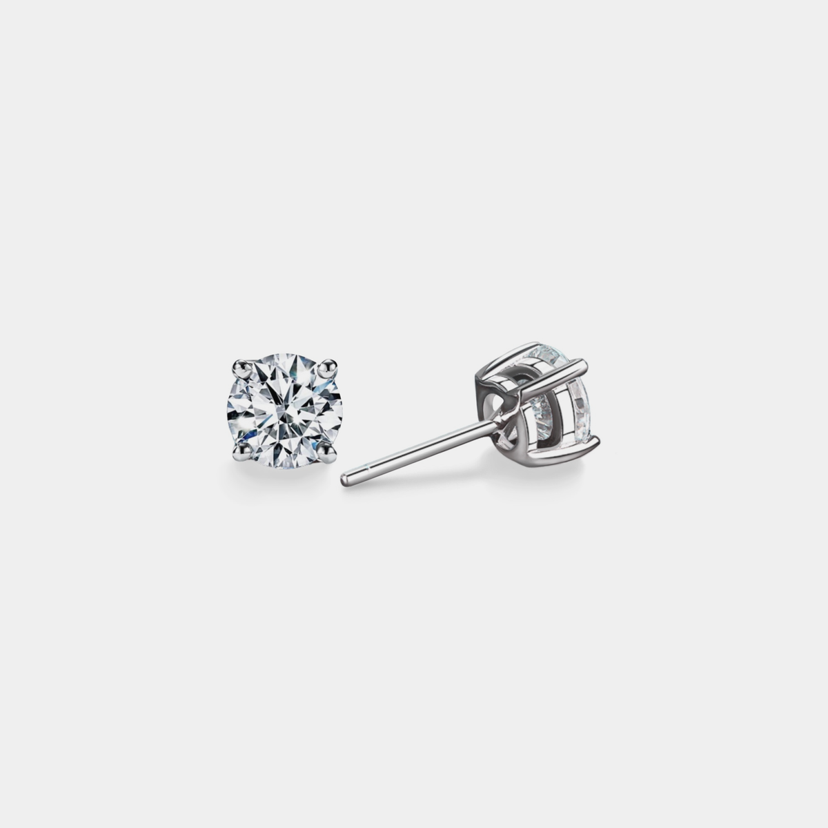 Four-Prong Moissanite Stud Earrings in 925 Sterling Silver: Silver / 2.0 ct