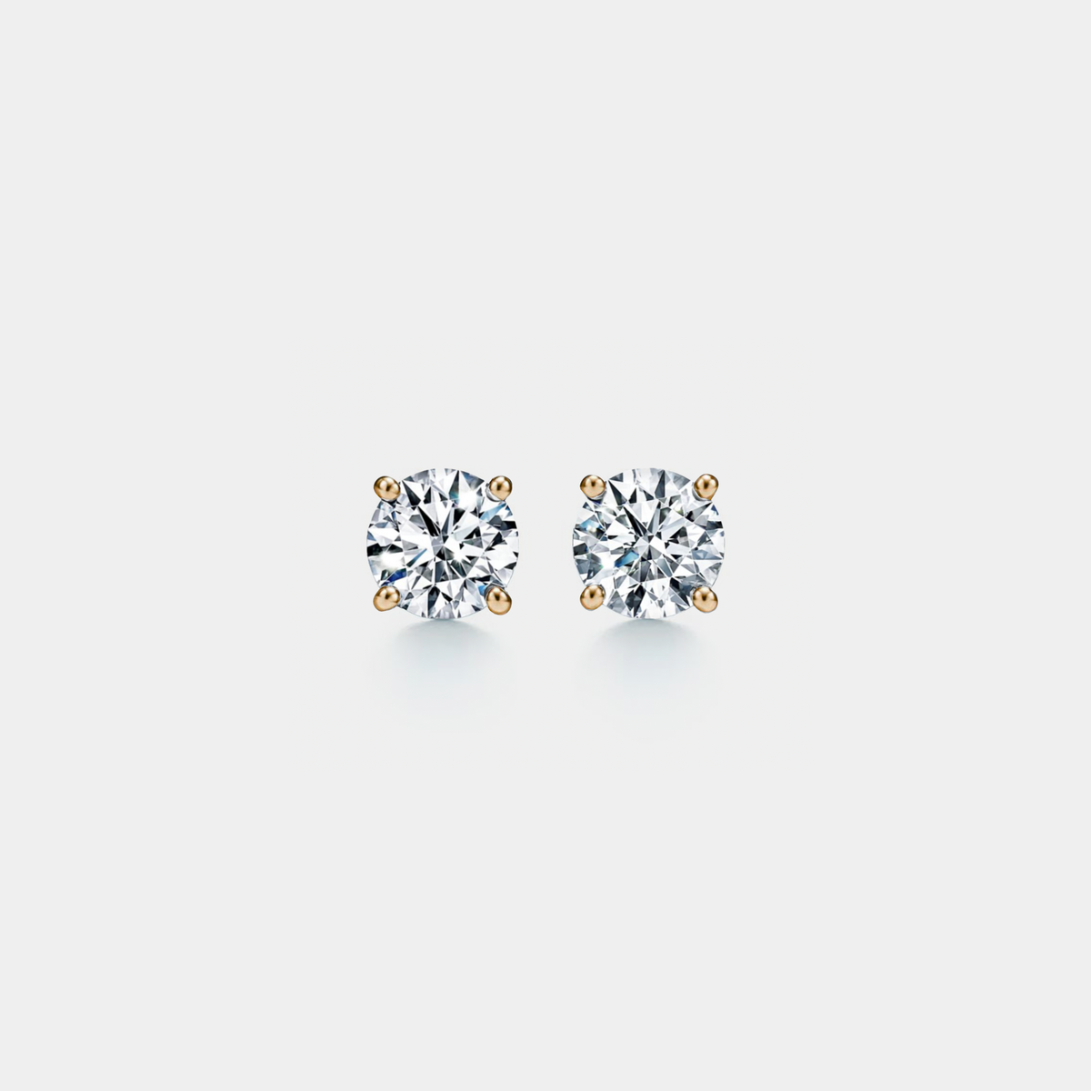 Four-Prong Moissanite Stud Earrings in 925 Sterling Silver: Silver / 2.0 ct